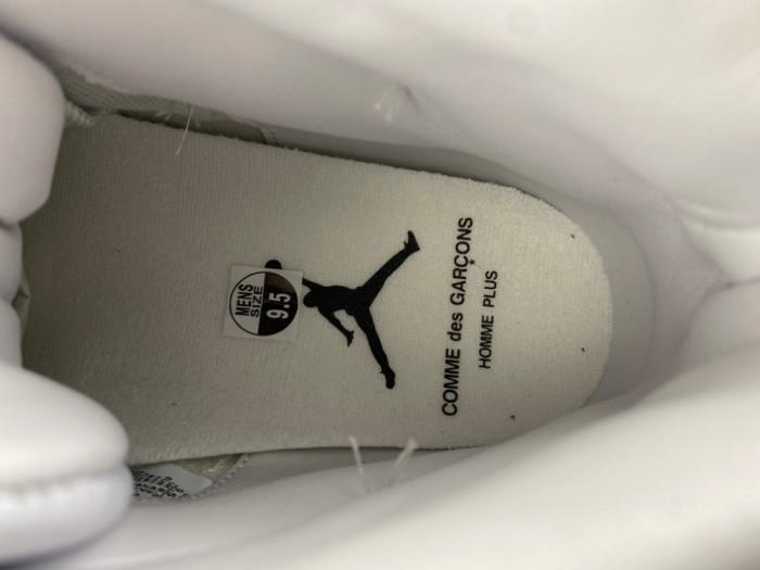 Air Jordan 11 Pack Expected Fall COMME des GARÇONS (2026) IV7639-100
