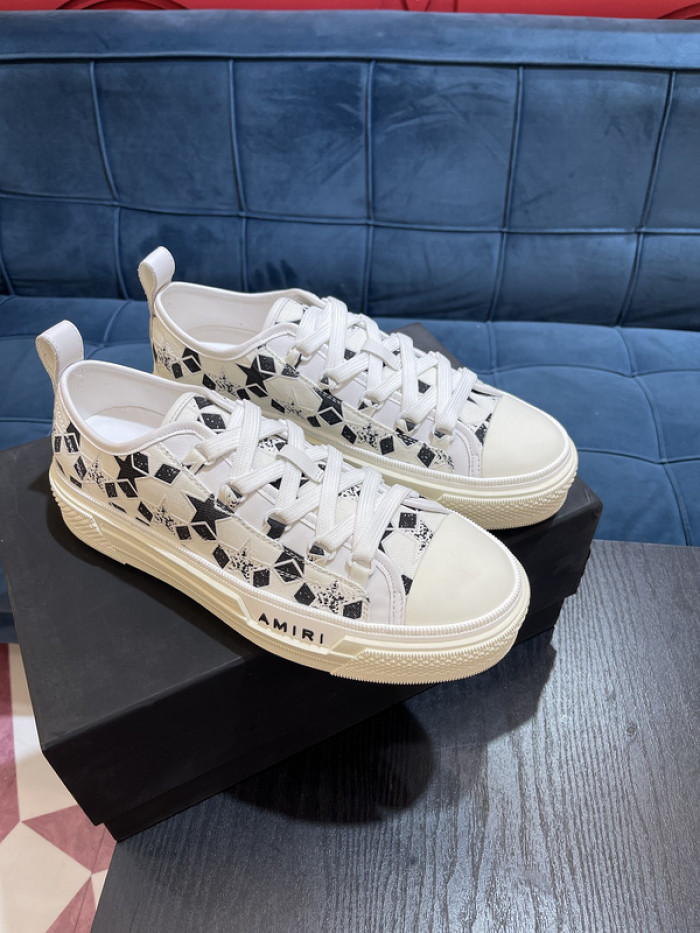 amiri* appliquéd leather and canvas sneakers